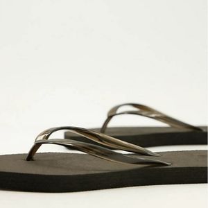 NWT Truffle Collection flip flops.